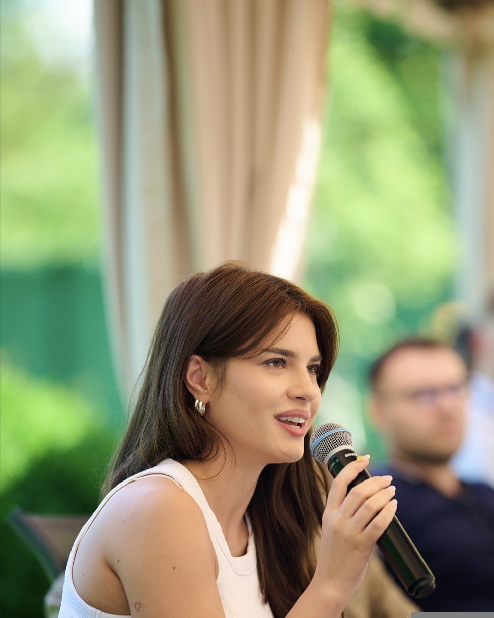 Founder speaking on stage